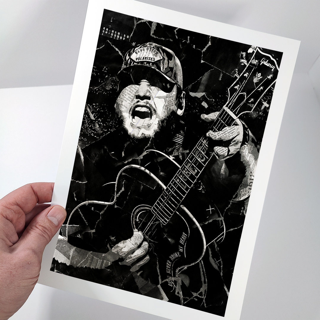 A Luke Combs poster design - a portrait of Luke created using a collage of torn pieces of magazine pages in black and white.